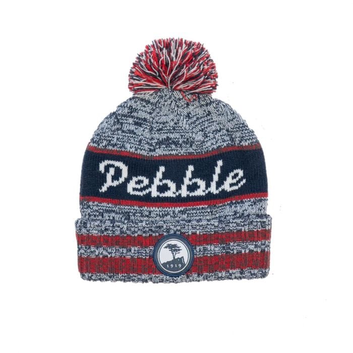 Knitted grey blue and red beanie with pom-pom and 'Pebble' text and a small pebble beach logo on a white background