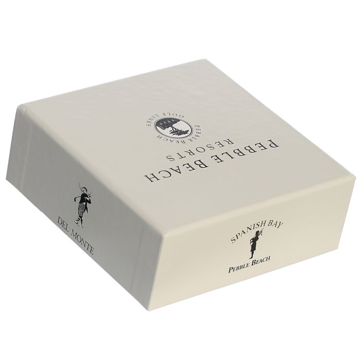 Beige box with Pebble Beach Resorts, Del monte golf course, and Spanish bay branding on a white background