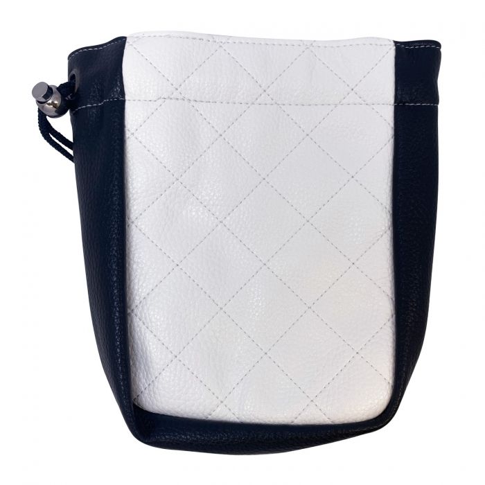 Back of White quilted bag with black accents on a white background