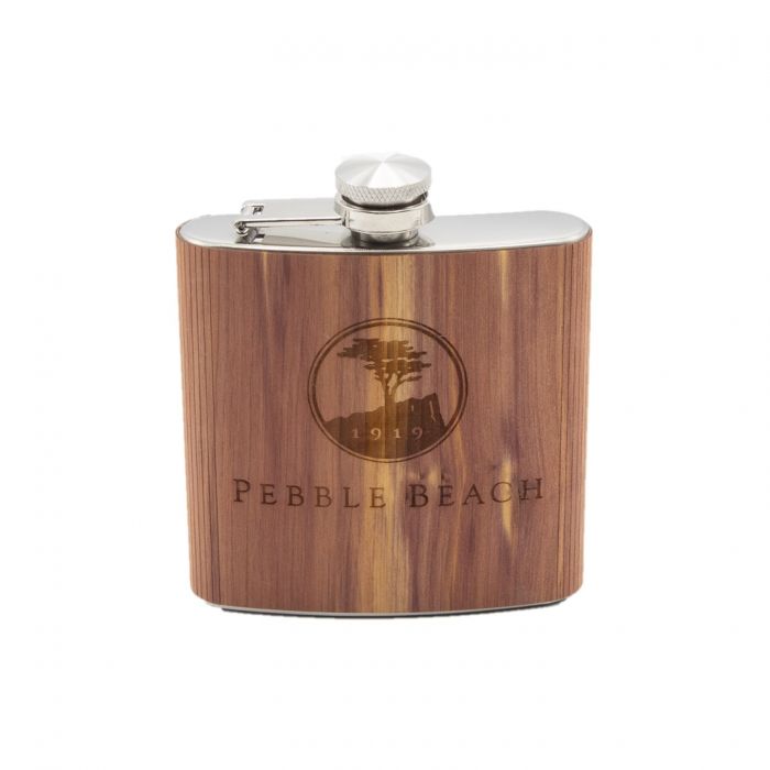 Wooden flask with 'Pebble Beach' branding on a white background