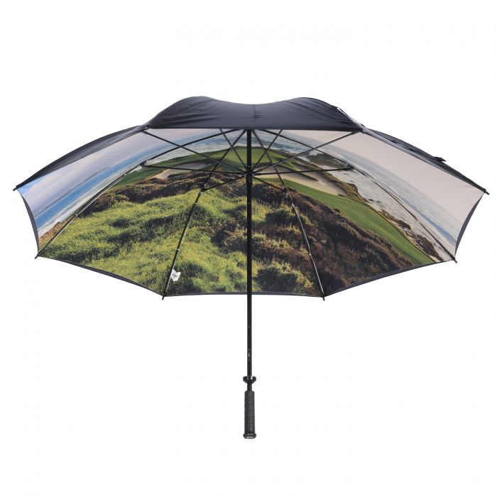 Black umbrella with scenic landscape design on a white background