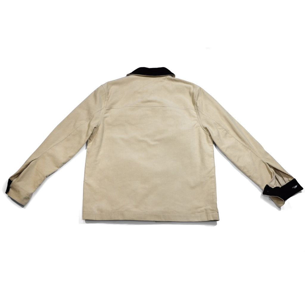 Beige jacket with black trim on a white background