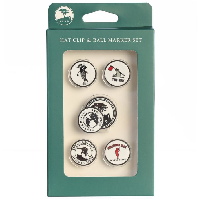 Hat clip with pebble beach golf links logo and ball marker set with Delmont golf, Spanish bay links, Spyglass hill and the hay golf course logos in a green packaging on a white background.