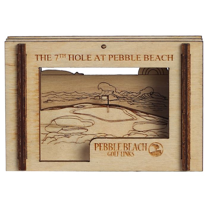 Wooden plaque with Lazer-cut engraving of a golf course at Pebble Beach on a white background