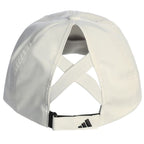 Back of White Adidas cap with a criss cross design on a white background