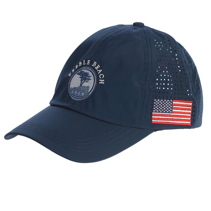 Navy blue cap with American flag patch on the side and a pebble beach logo on a white background