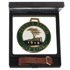  Green Bag tag with pebble Beach Golf Links logo in a black case with a brown strap on a white background