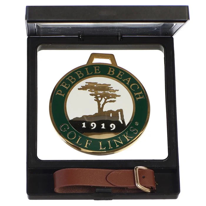  Green Bag tag with pebble Beach Golf Links logo in a black case with a brown strap on a white background
