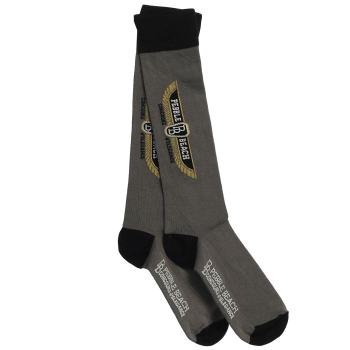 Gray sock with black accents and a pebble beach concours de elegance logo on a white background