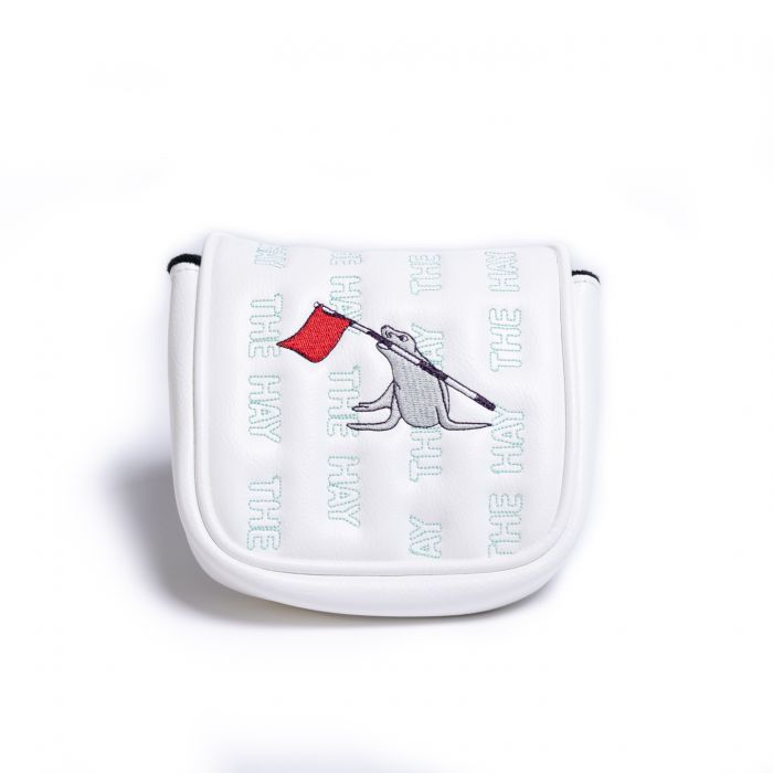White golf club mallet head cover with Cynthia the sea lion character and 'the hay' text on a white background.