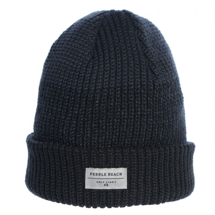 Dark blue knit beanie with a pebble beach label on a white background
