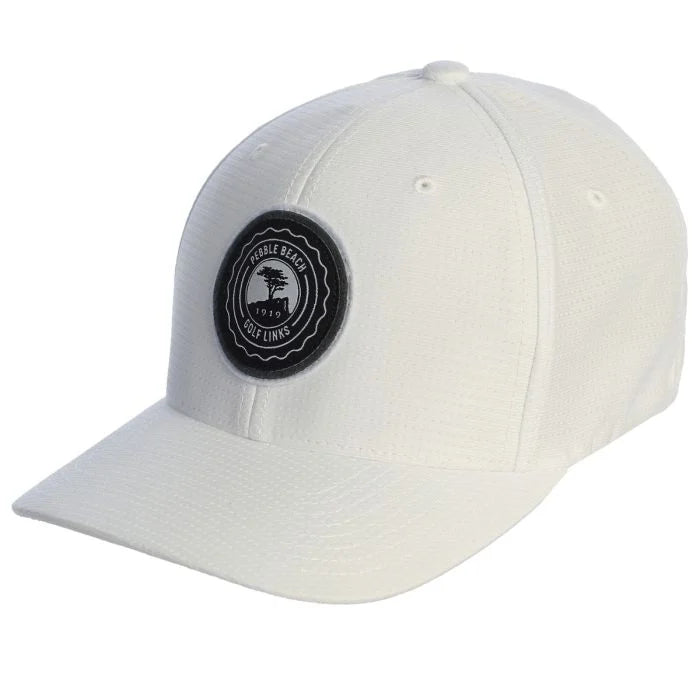 White cap with a black pebble beach logo on a white background