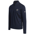 Navy half zip long-sleeve shirt with a Nike logo on the sleeve and pebble beach logo on the chest on a white background