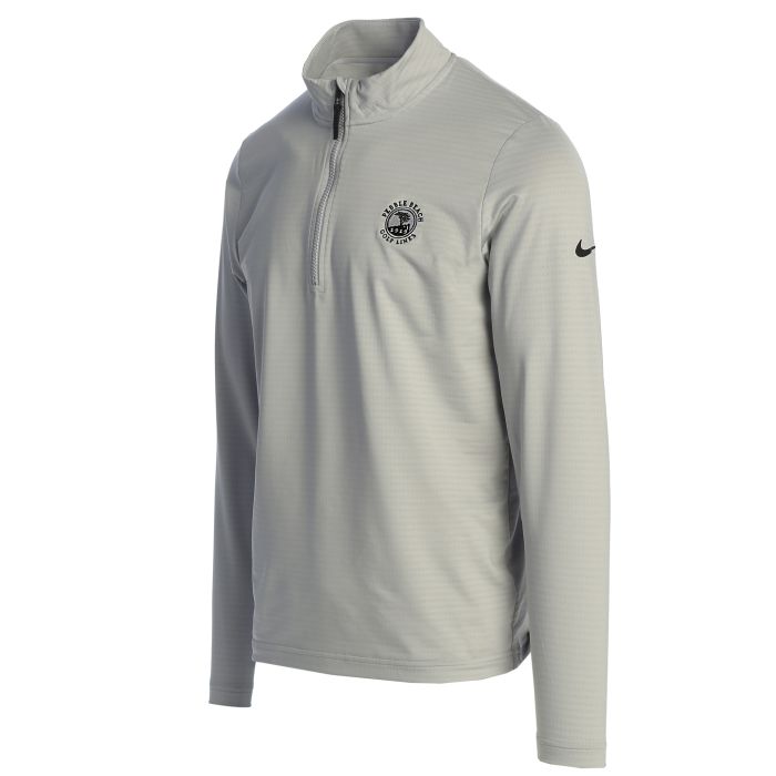 Gray half zip long-sleeve shirt with a pebble beach logo on the chest and a Nike logo on the sleeve on a white background