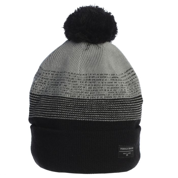 Gray and black beanie with a pom-pom and small pebble beach tag on a white background