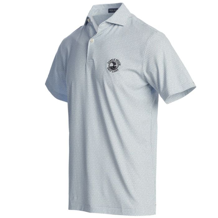 Light blue polo shirt with a pebble beach logo on a white background