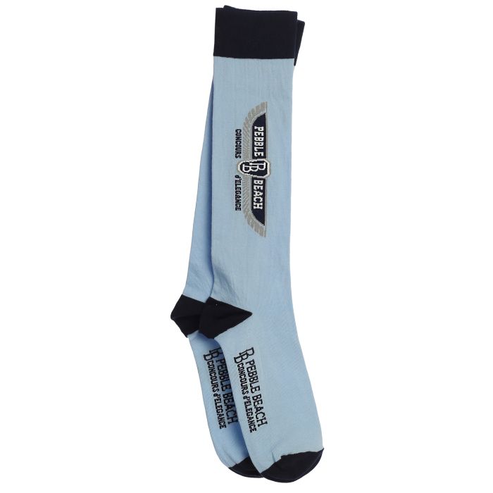 Light blue sock with black accents an a pebble beach concours de elegance logo on a white background