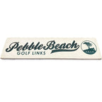 white wooden sign with 'Pebble Beach Golf Links' text in green on a white background.