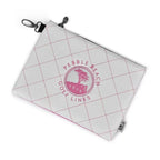 pink and white quilted pouch with a pink pebble beach golf links logo on a white background
