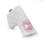 Pink and white quilted putter blade head cover with a pebble beach golf links logo on a white background