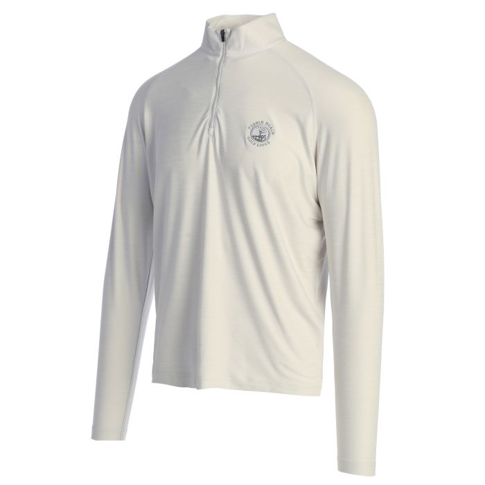 White long-sleeve shirt with a pebble beach logo on a white background