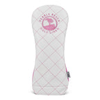 Pink and white quilted diver head cover with a pink pebble beach logo on a white background