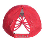 Back of a bright pink cap with a unique criss cross design on a white background