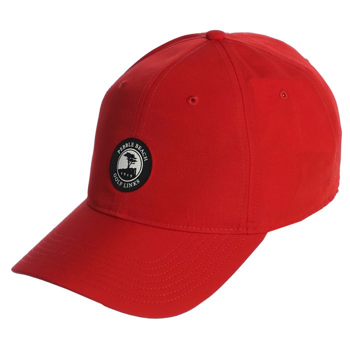 Red cap with a pebble beach golf links logo on a white background
