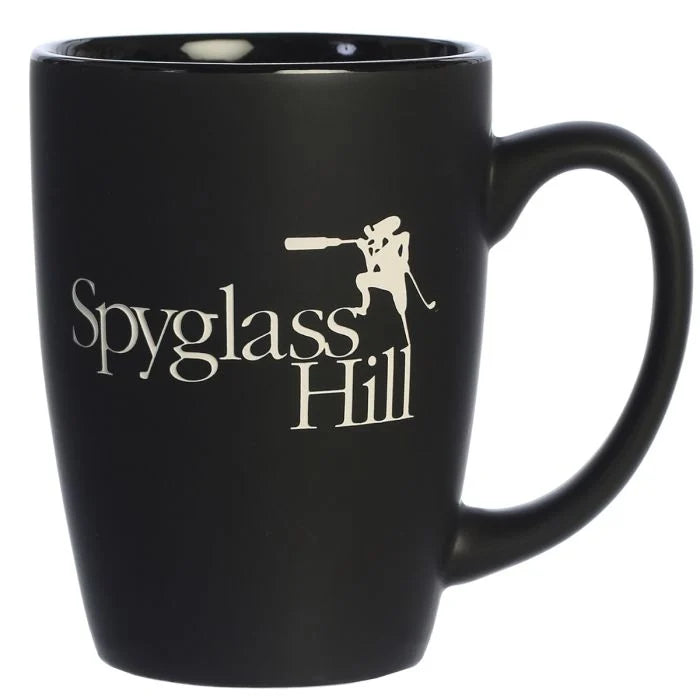 Black mug with 'Spyglass Hill' logo on a white background