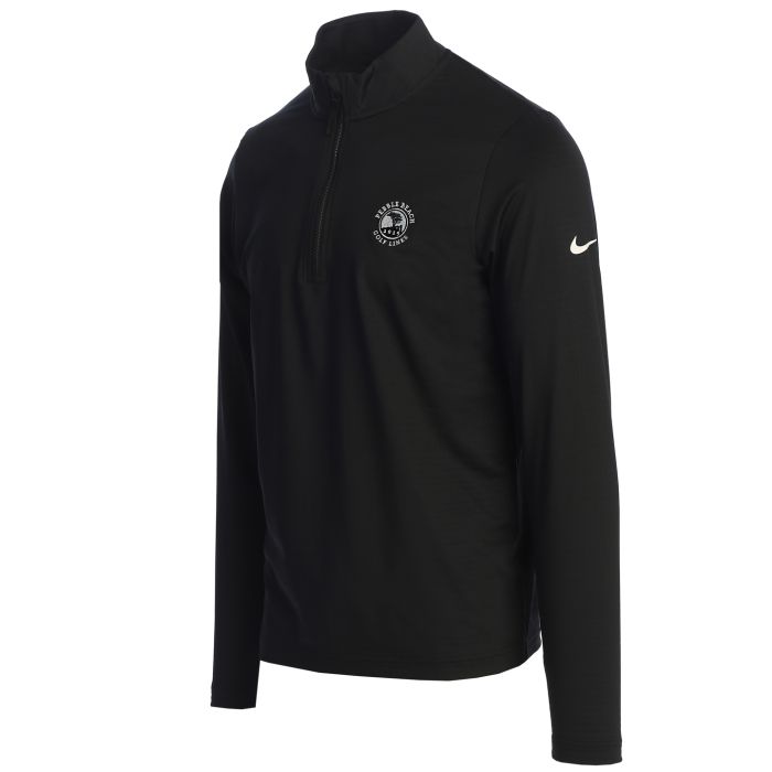 Black half zip long-sleeve shirt with a Nike logo on the sleeve and pebble beach logo on the chest on a white background