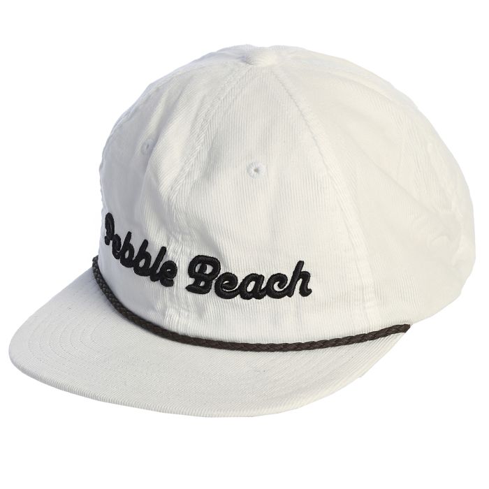 White corduroy cap with 'Pebble Beach' text in black and a brown leather rope on a white background