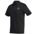 Black polo shirt with a Pebble Beach logo on chest on a white background